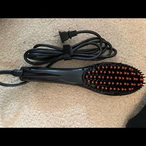 Never been used hair straightener brush